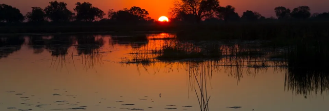 Sun setting over the Okavango Delta in the northern part of Botswana on June 08, 2014. (Getty Images)