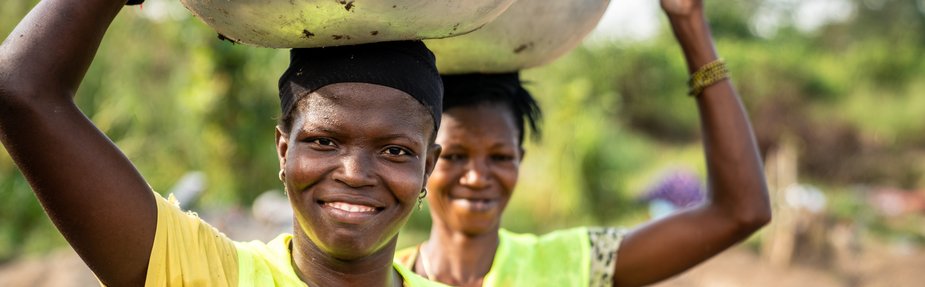 Two Women farming on a reclaimed Mining Site