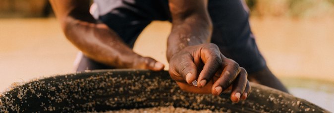 Rough Diamond in Miner's Hand